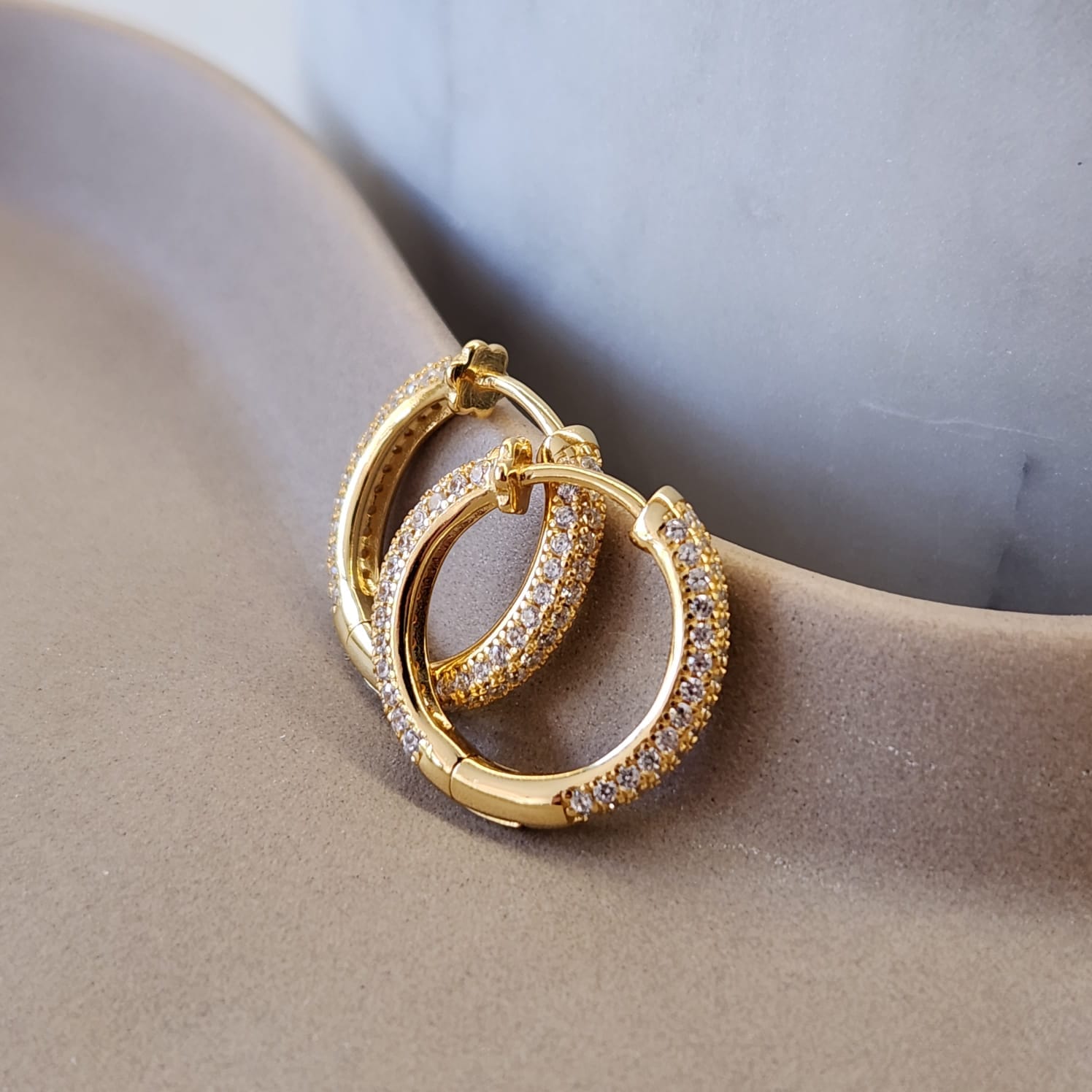Fine and Yonder Earrings Gold Large double sided zirconia huggie