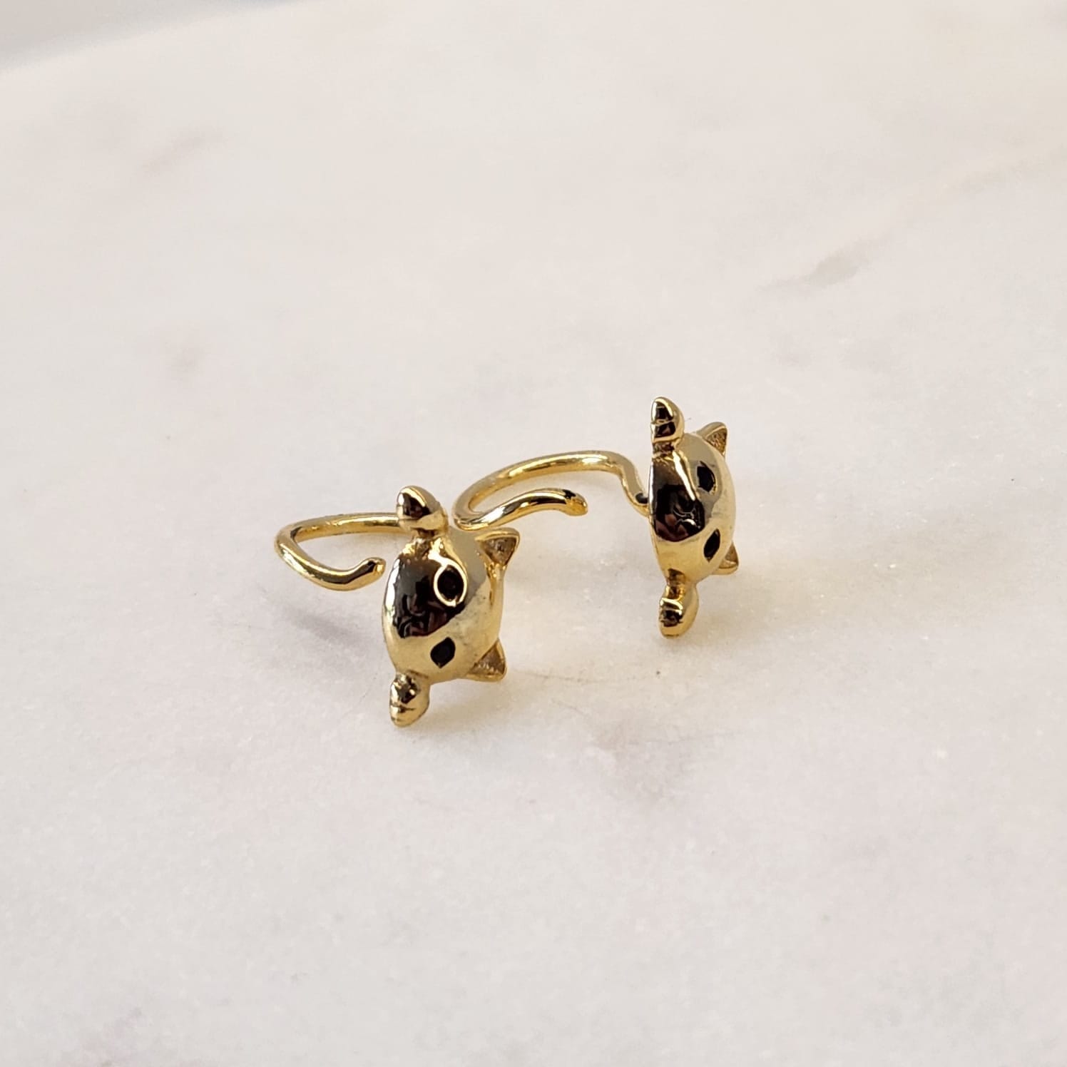 Lazy Cat Earrings gold tone Suprene Collective worn on ear