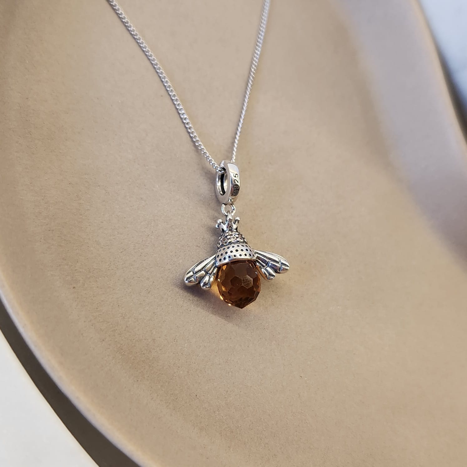 Bee Pendant Necklace Suprene Collective worn layered styling
