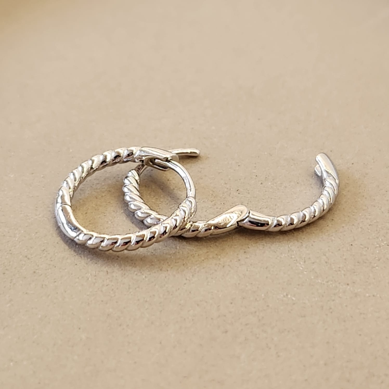 Braided Huggie Earrings platinum plated 1.3cm rope weave detail close up