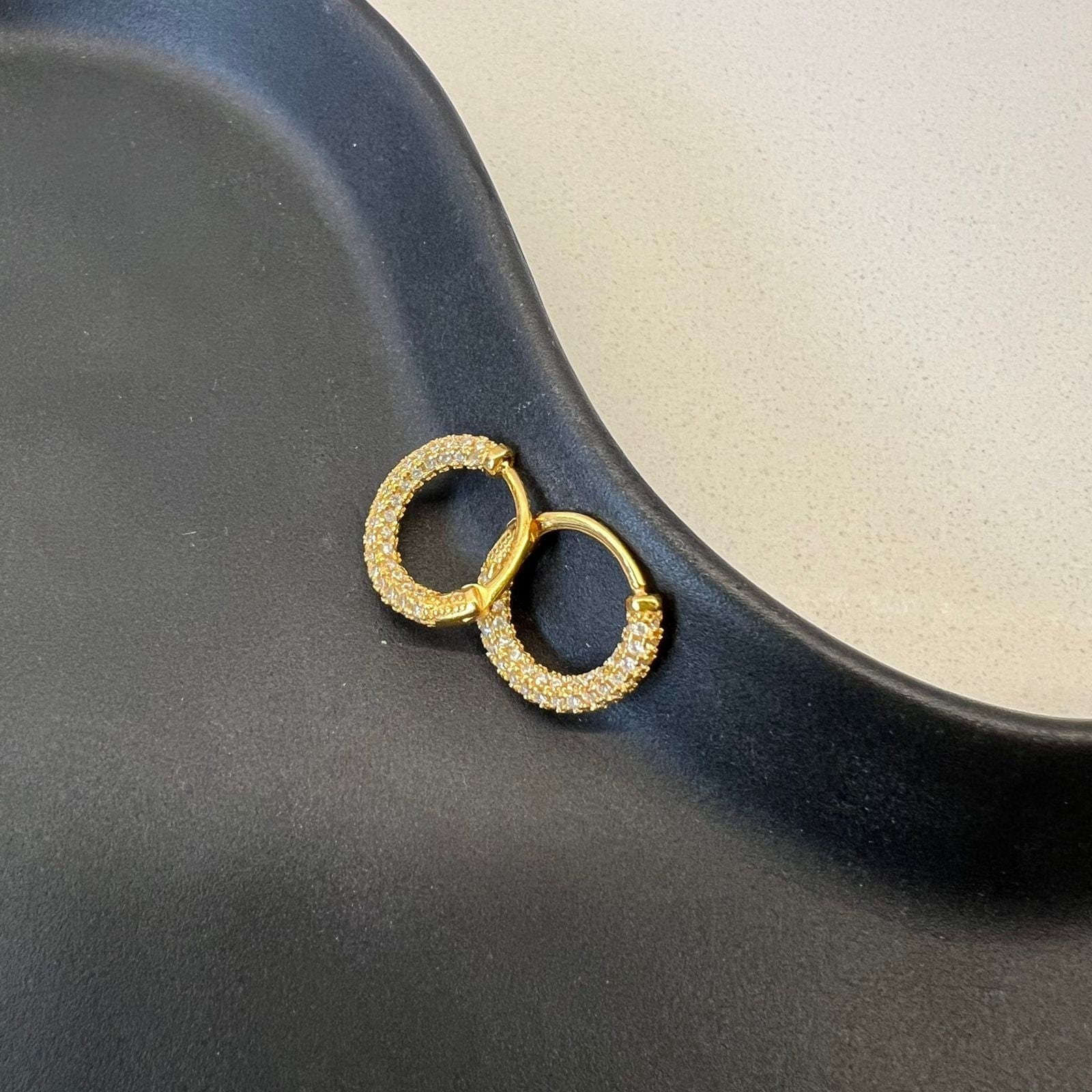 CZ Crusted Huggie Earrings all-around cubic zirconia crust detail