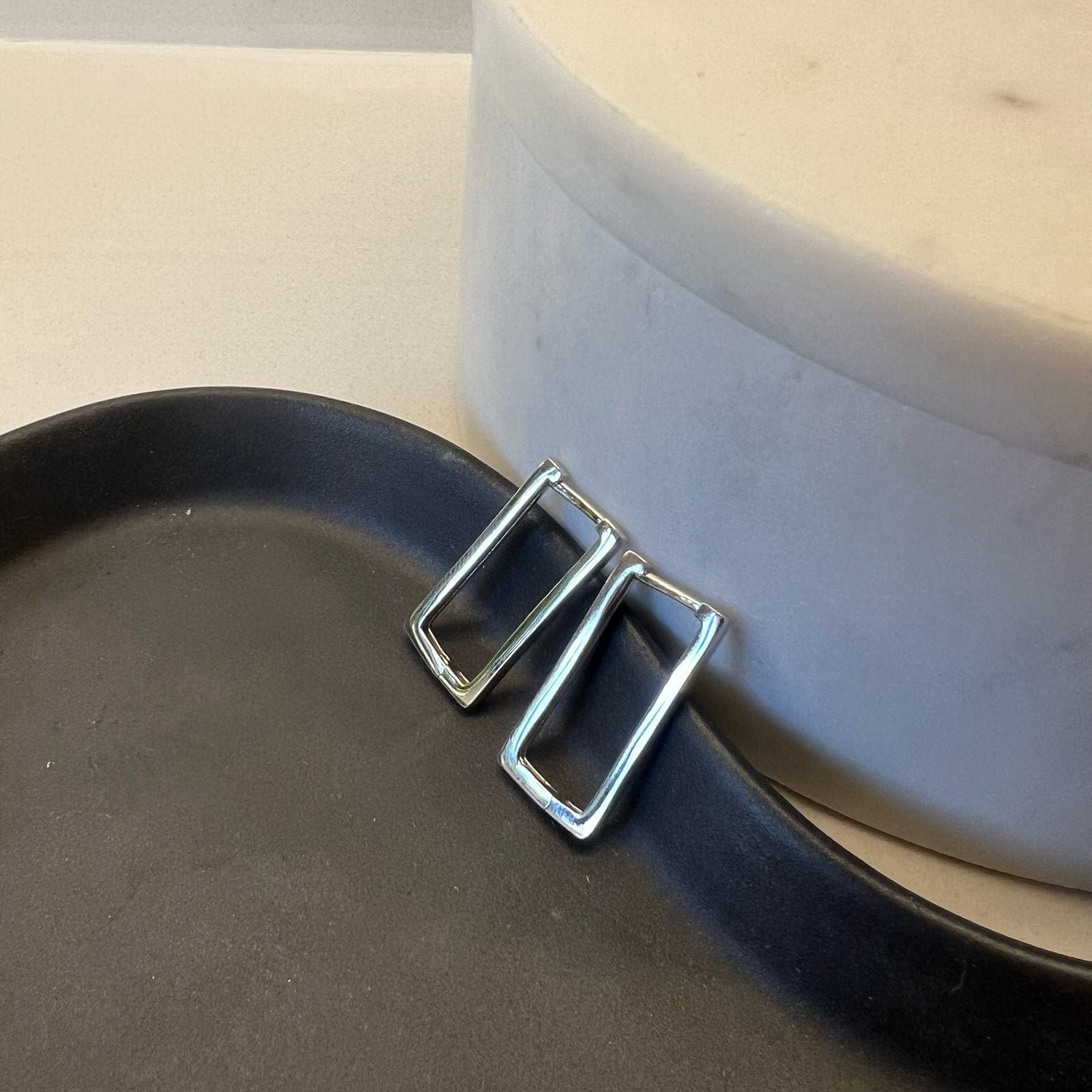 Roola Rectangle Huggie Earrings worn on ear everyday styling