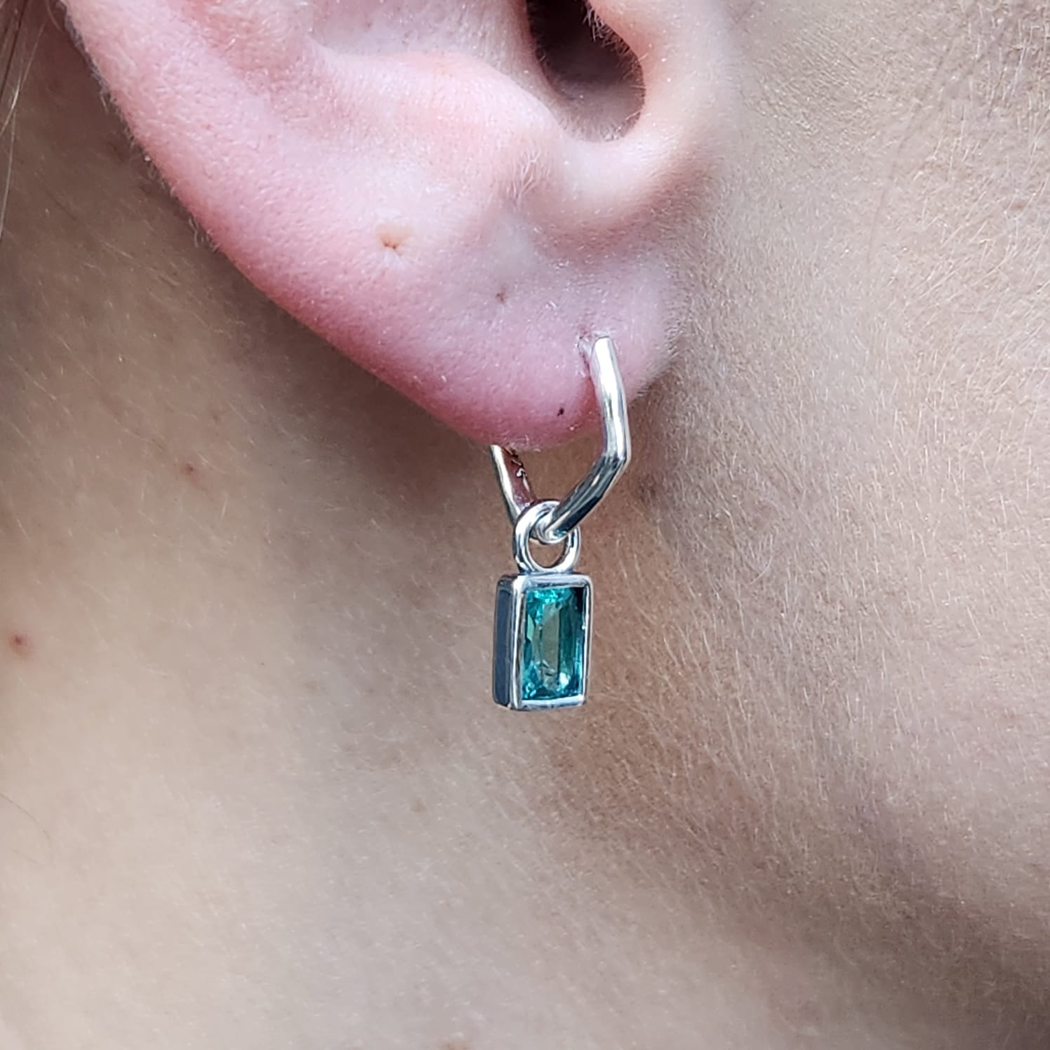 Teal CZ Pendant Earrings rectangular teal cubic zirconia close up detail