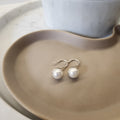 Suprene Collective Pearl Drop Earrings 925 Sterling Silver hook shell pearl silver tone