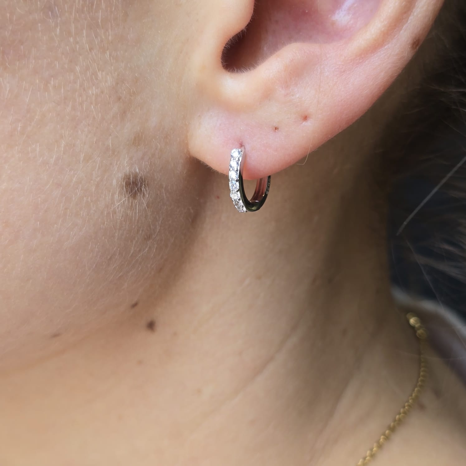 Zirconia Huggie Earrings close-fitting 925 Sterling Silver worn on ear