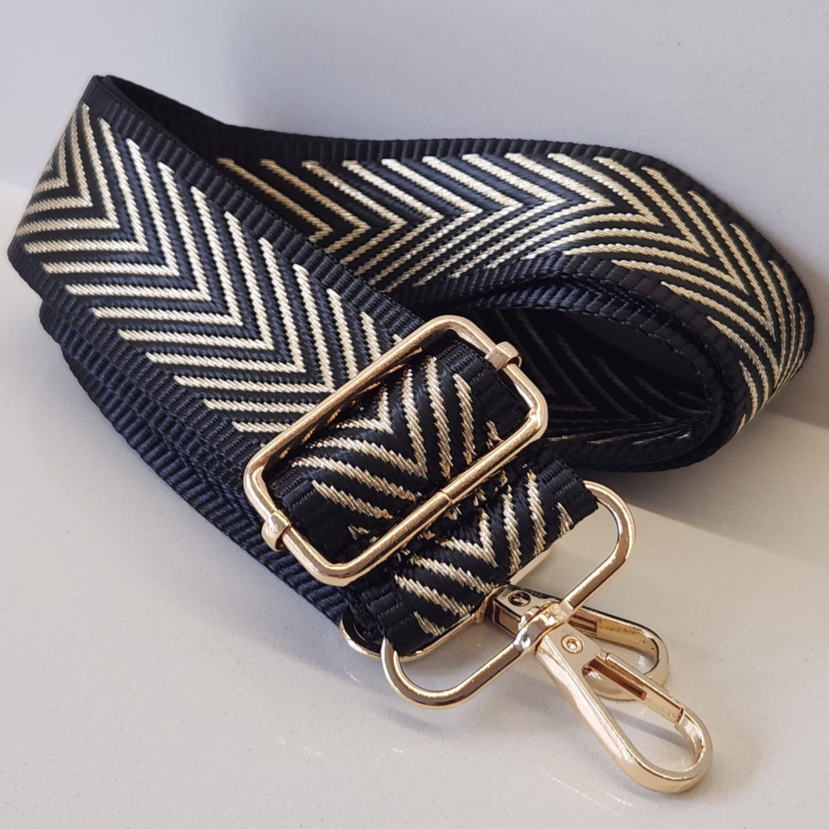 Black and gold online bag strap