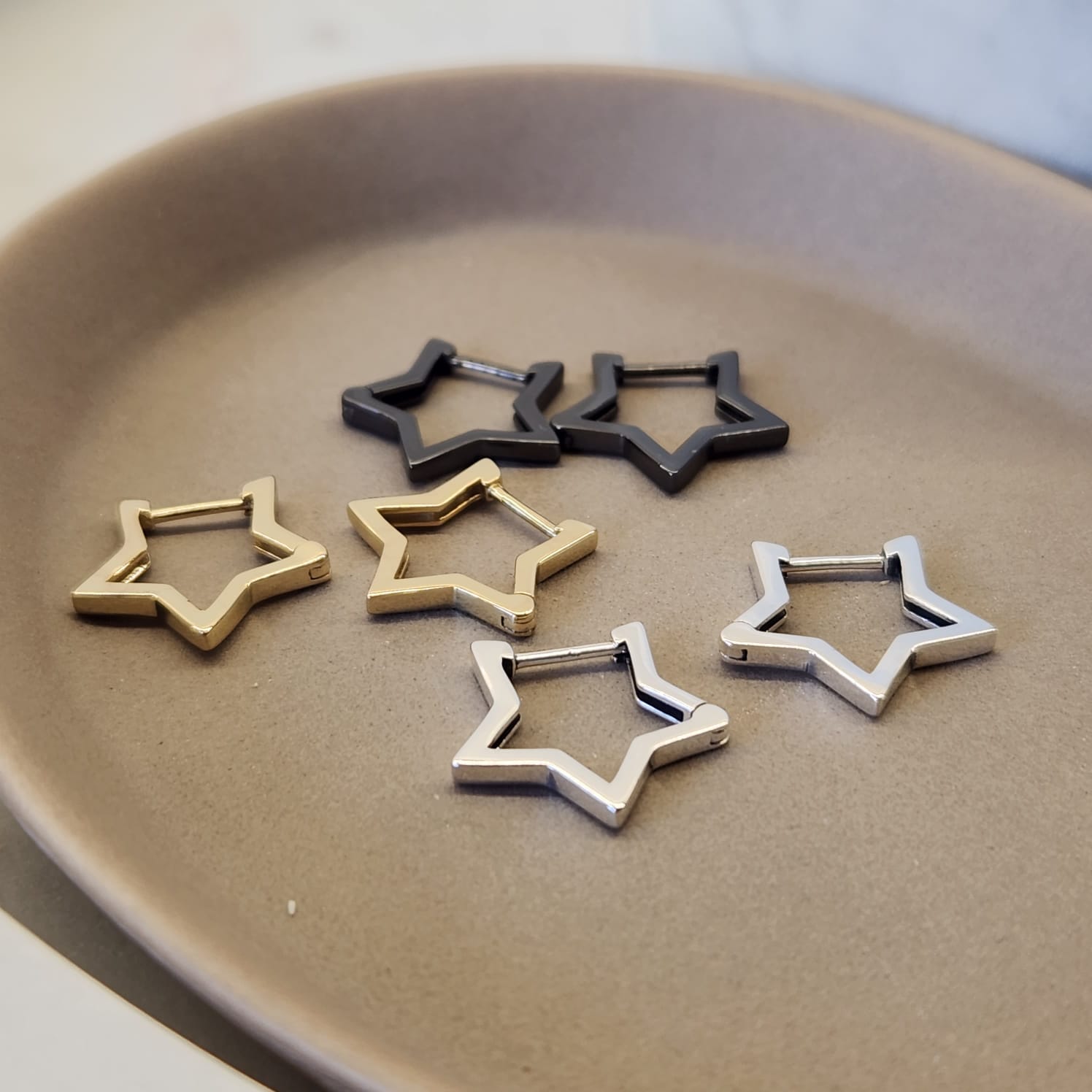 Suprene Collective Star Huggie Earrings 925 Sterling Silver star silhouette